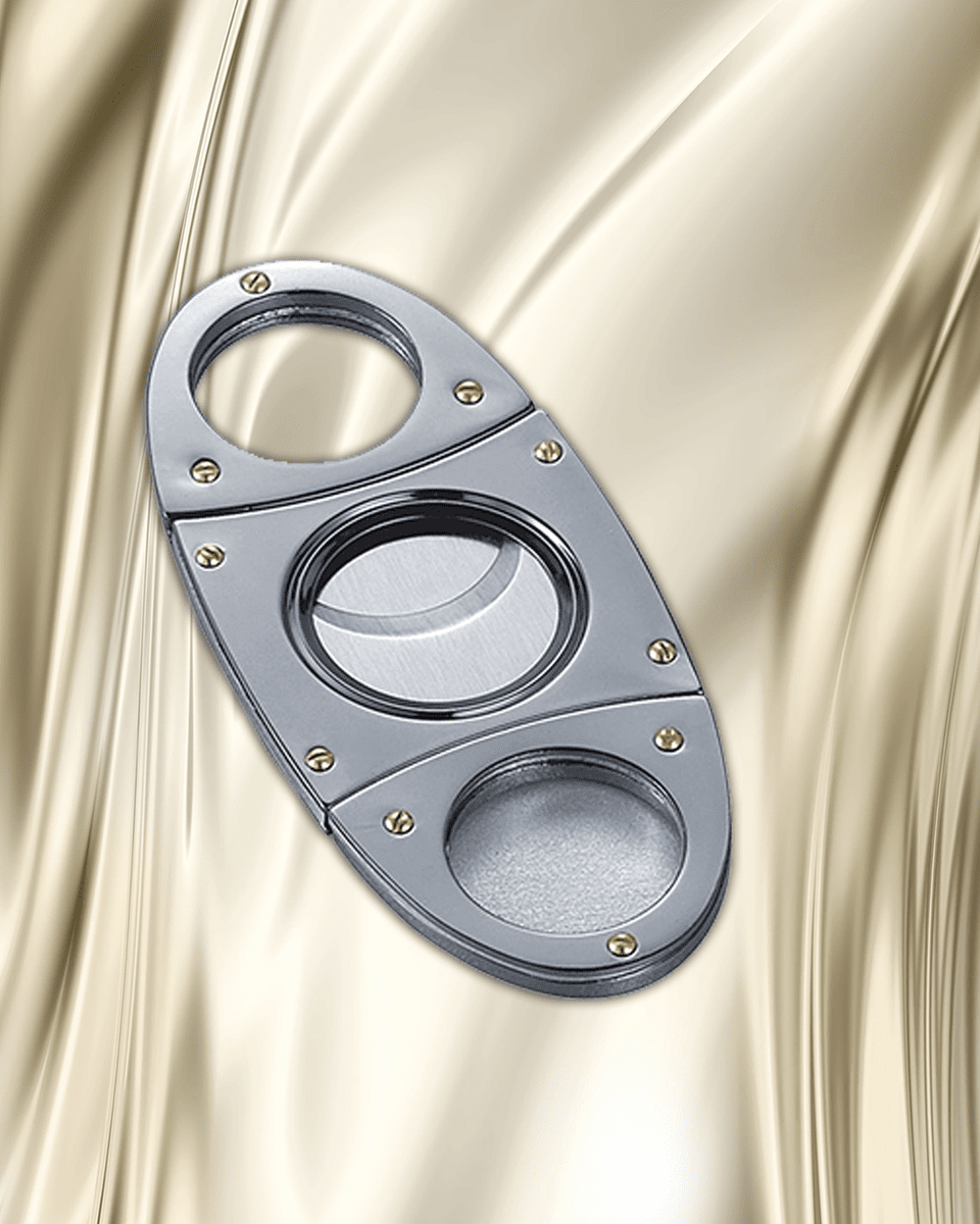 Cigar Lifestyle Accessories: Cigar Cutter in Silver with Gold Accents